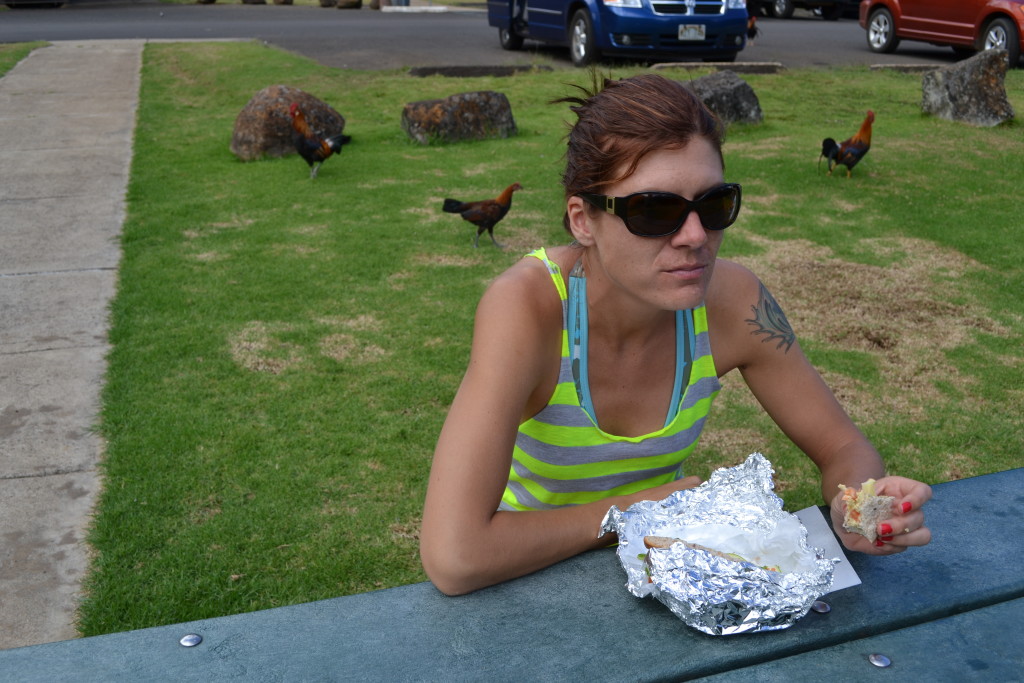 Not amused with the chickens behind her waiting for free handouts